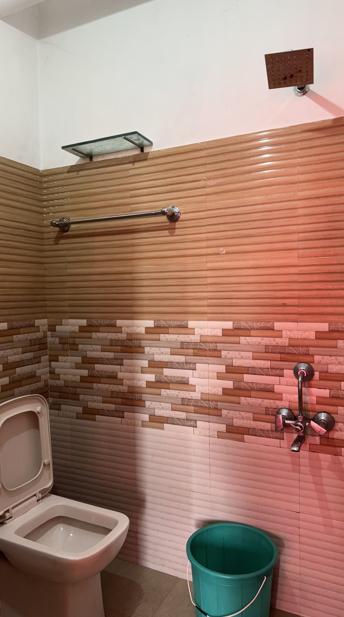 Bathroom and shower area at Jumayira International